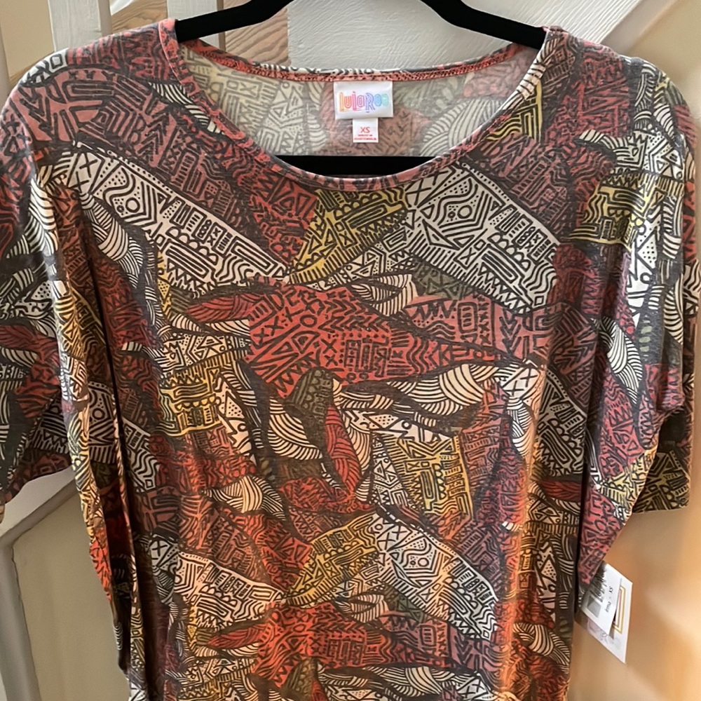 LuLaRoe Irma Top. BNWT. Abstract, cool design!